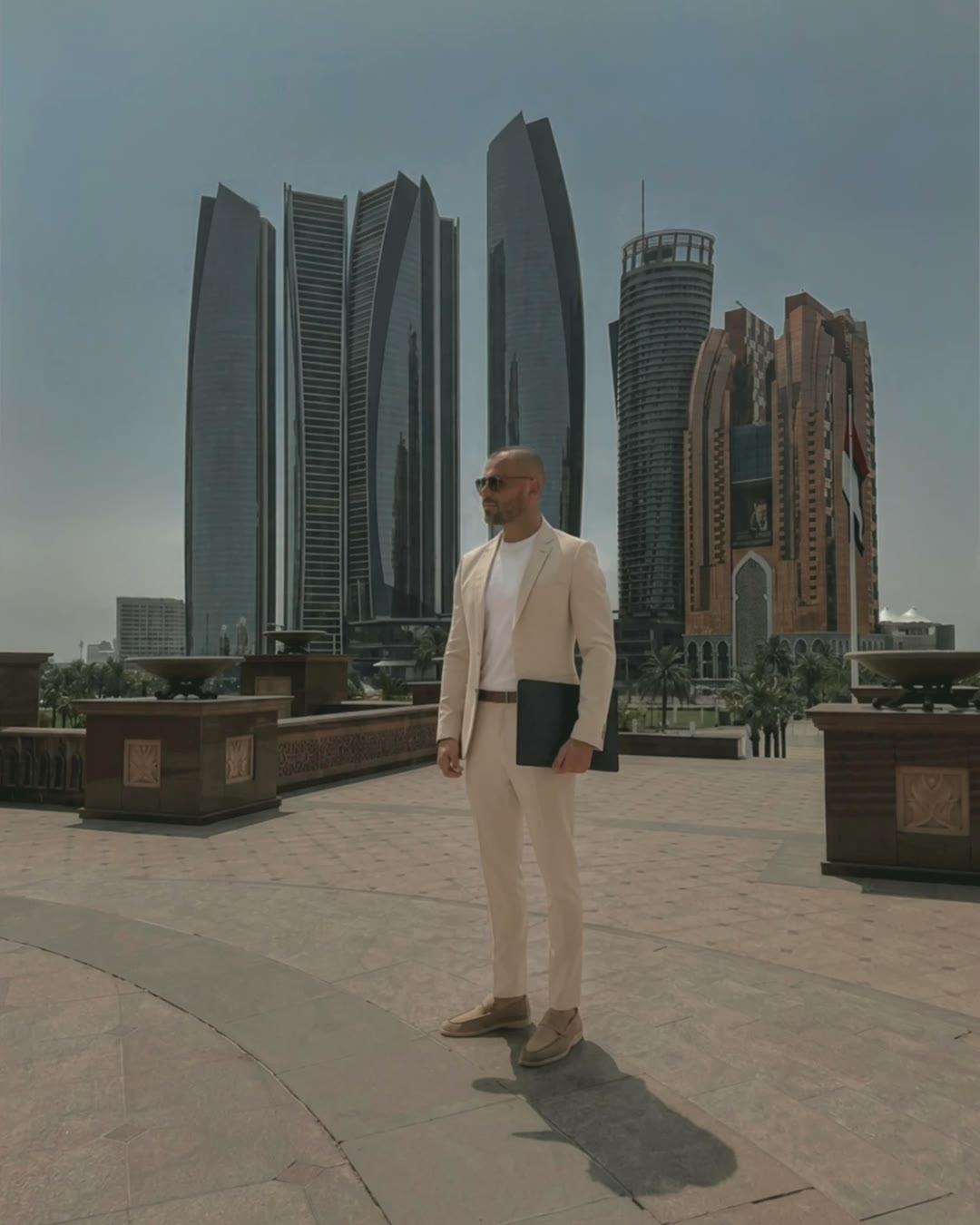 Mitch Hayles in Abu Dhabi, in front of Etihad Towers